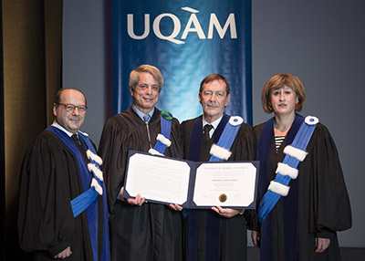 Lorne Trottier receiving his honorary doctorate from UQAM