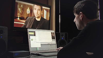Man on laptop configuring video recording with Monarch HD